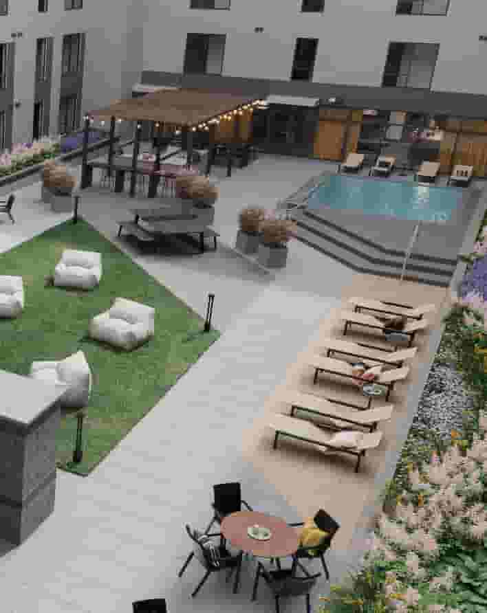 Outdoor courtyard with lounge and spa